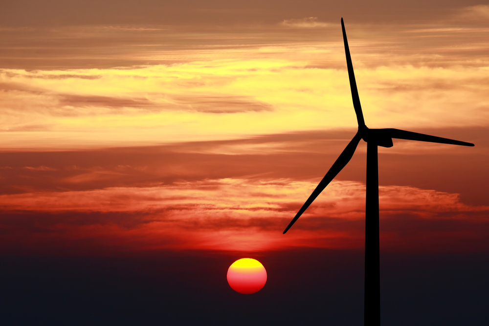 Sun Set behind wind turbine