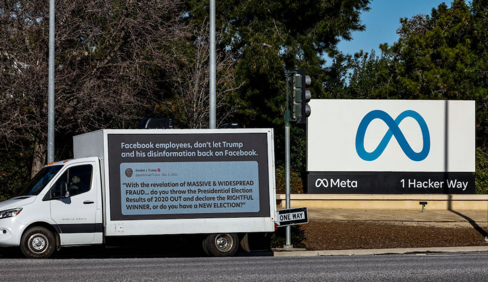 Image of mobile billboard outside of Meta Platforms Inc. headquarters urging the company not to reinstate former President Donald Trump's Facebook account.