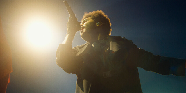 Image of The Weeknd in a scene from HBO's concert film “The Weeknd: Live at SoFi Stadium